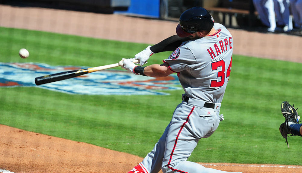 Bryce Harper hits a first inning solo home run against the Atlanta Braves at Turner Field