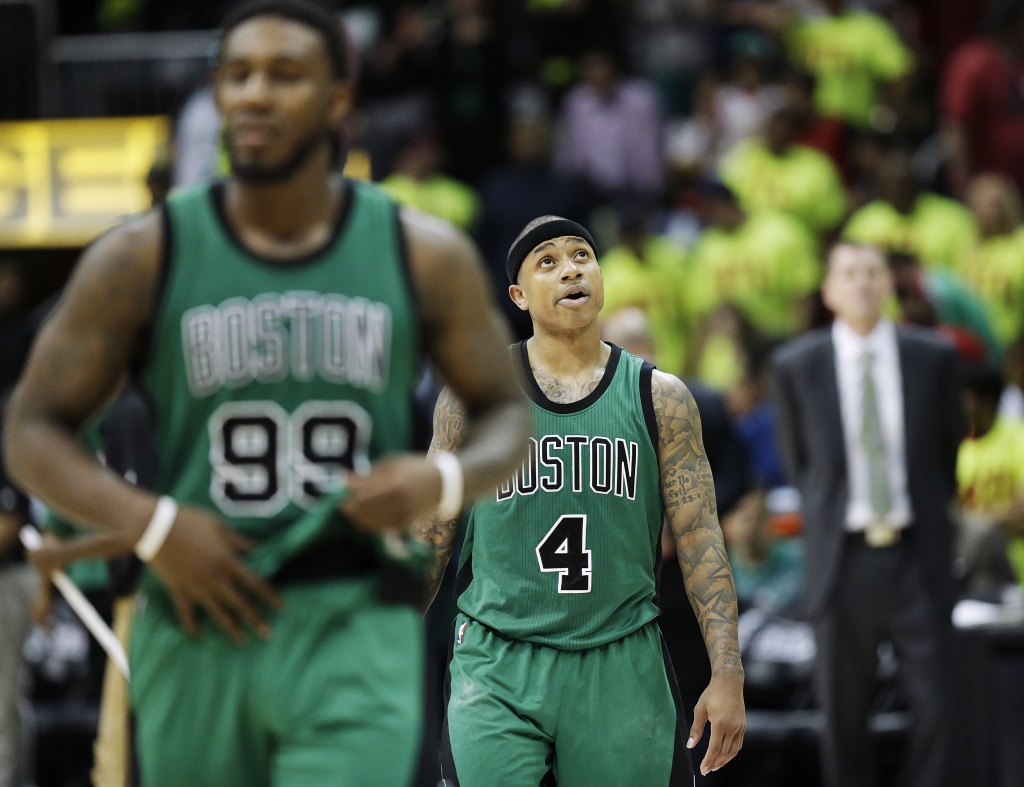 Boston Celtics&#039 Isaiah Thomas looks up toward the scoreboard in the final seconds of Game 1 of a first-round NBA basketball playoff series against the Atlanta Hawks Saturday