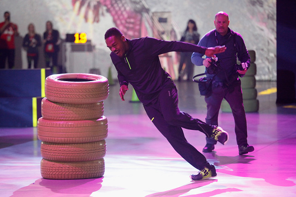 NEW YORK NY- MARCH 04 UFC fighter Jon Jones trials a pair of Reebok ZPump Fusion shoes at Reebok's launch of the revolutionary new ZPump Fusion at Spring Studios