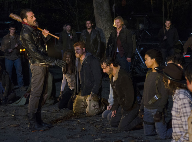 In this image released by AMC Jeffrey Dean Morgan standing left and kneeling from left Danai Gurira Michael Cudlitz Andrew Lincoln and Sonequa Martin-G