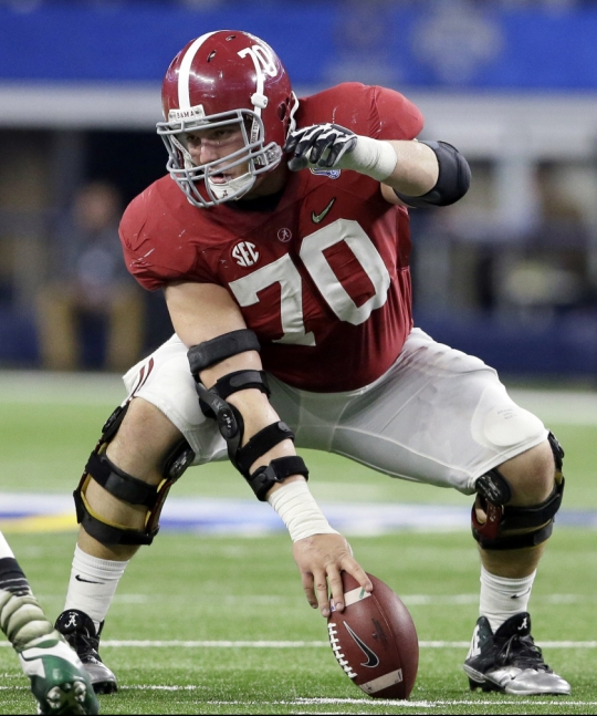 Alabama center Ryan Kelly sets up for a play against Michigan State during the first half of the Cotton Bowl NCAA college football semifinal playoff game Dec. 31 in Arlington Texas