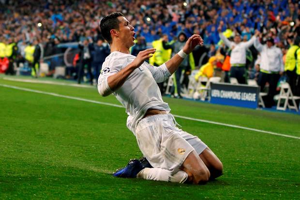 Cristiano Ronaldo celebrates scoring his third goal to send Real on their way to the Champions League Semi-Finals. (AP