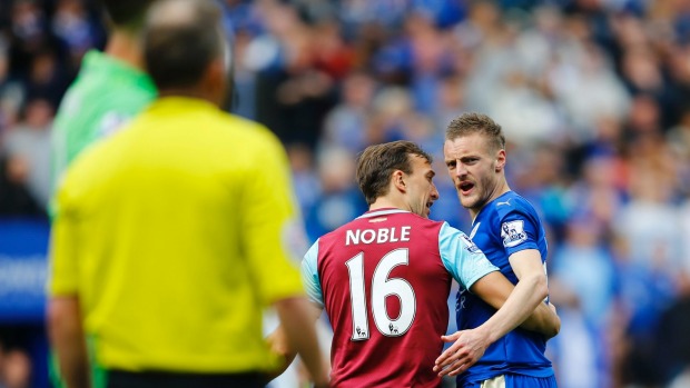 FWest Ham's Mark Noble leads away Leicester star Jamie Vardy after the sriker was red-carded