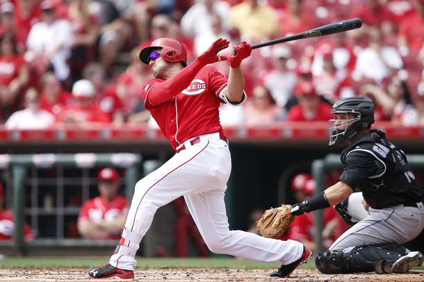 Reds rally to beat Rockies in series finale