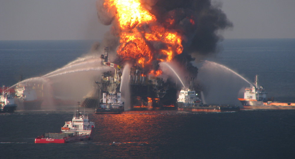 Fire boat response crews battle the blazing remnants of the off shore oil rig Deepwater Horizon