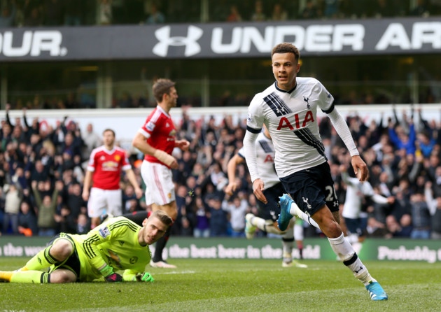 Dele Alli wheels away after scoring the opening goal