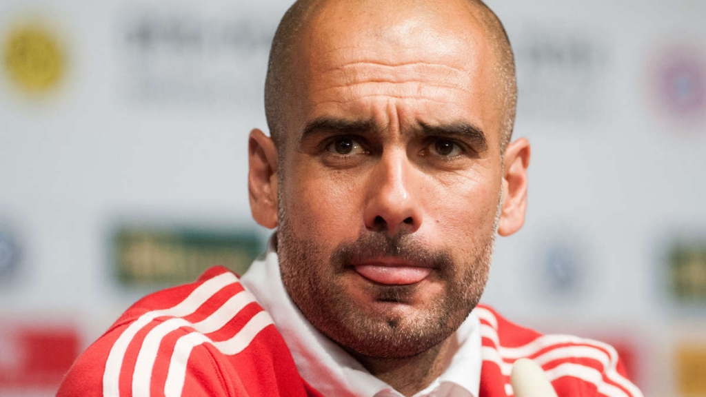 611205834-guardiola-Mo7p0qBdbef