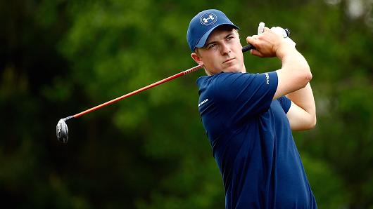 Jordan Spieth of the United States hits his tee shot on the ninth hole during the first round of the Shell Houston Open at the Golf Club of Houston