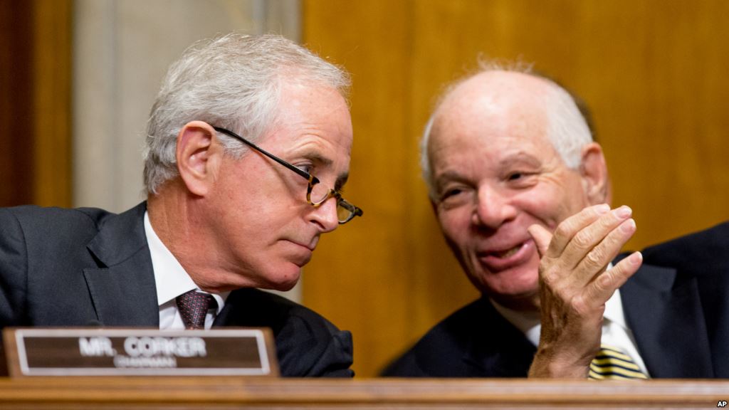 Chairman Bob Corker R-Tenn. left and ranking member Ben Cardin D-Md. confer as the State Department's Thomas Shannon testifies at a Senate Foreign Relations Committee hearing on Capitol Hill in Washington