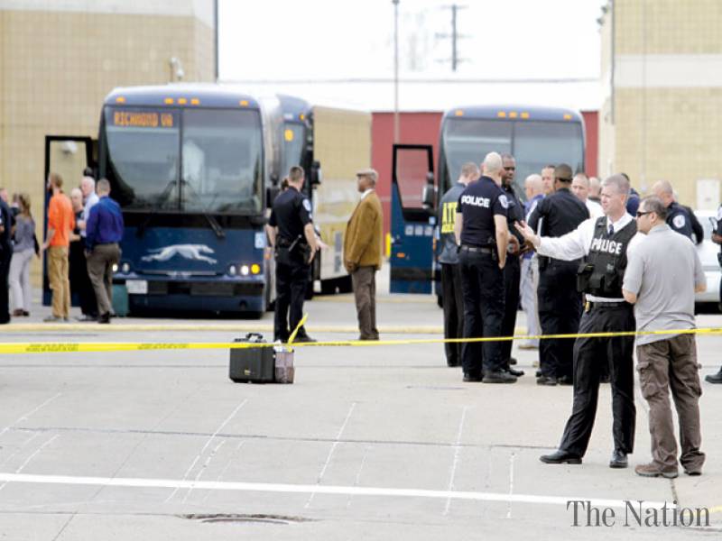 Gunman police officer killed in US bus station shootout