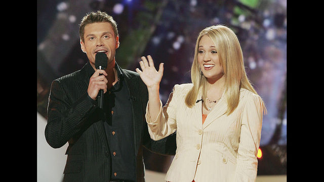 LOS ANGELES- MAY 24 Host Ryan Seacrest and finalist Carrie Underwood appear onstage at the