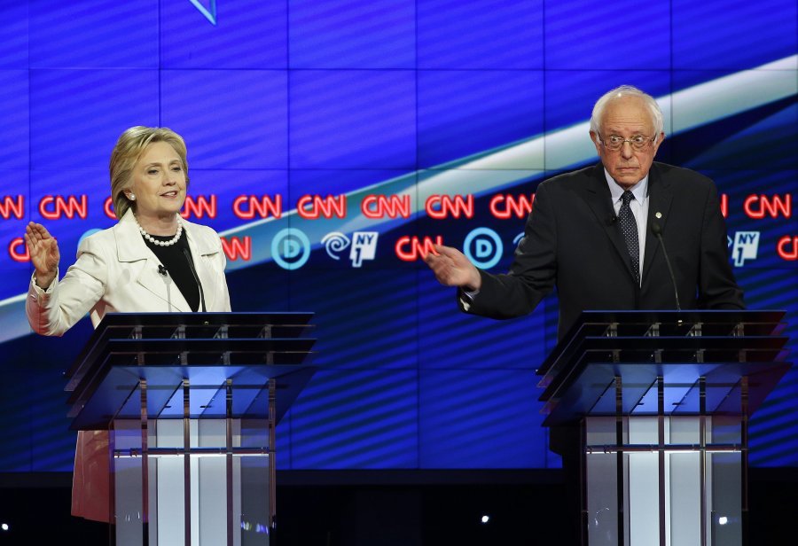 Associated Press Democratic presidential candidate Sen. Bernie Sanders I-Vt. and Hillary Clinton speak during the CNN Democratic Presidential Primary Debate at the Brooklyn Navy Yard Thursday