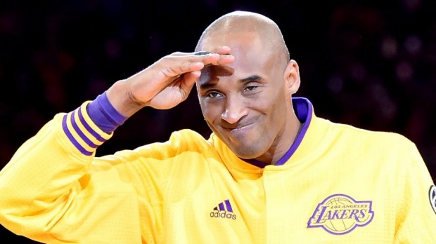 Kobe Bryant greets the crowd before his final game