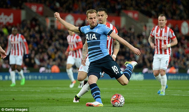 Harry Kane strikes at goal during Tottenham's 4-0 victory over Stoke at the Britannia Stadium on Monday