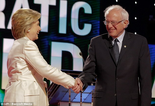 Hillary Clinton and Bernie Sanders shake hands at the end of a Democratic presidential primary debate last month.   Carlos Osorio    
  AP