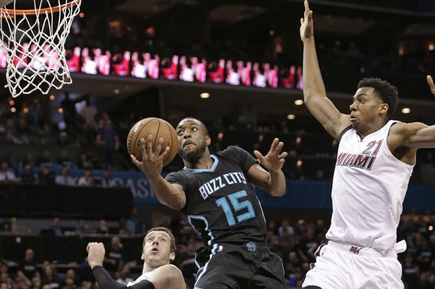 Hornets down Heat for first playoff game victory in 14 years