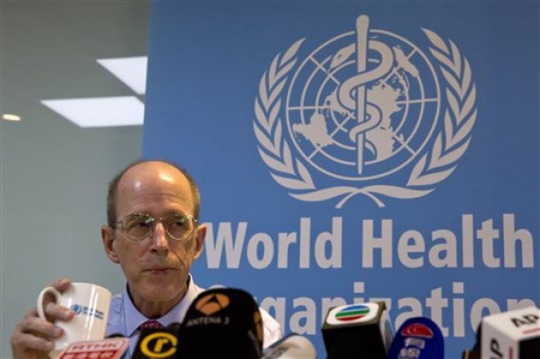 Dr. Lance Rodewald of World Health Organization China's immunization program listens to questions during a press conference in Beijing China Tuesday