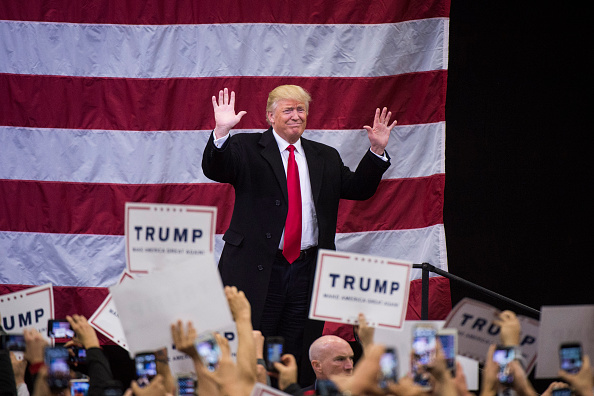 ROME NY- APRIL 12 Republican presidential candidate Donald Trump walks out to speak during a campaign event at Griffiss International Airport in Rome NY on Tuesday