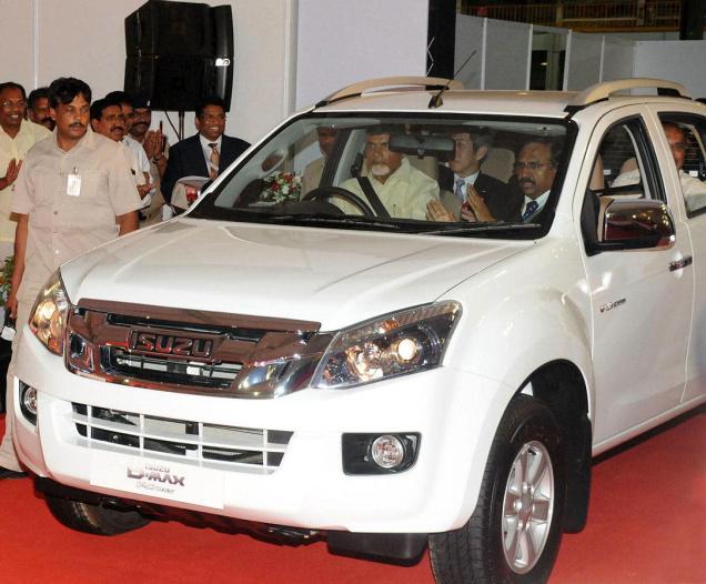 N Chandrababu Naidu Andhra Pradesh Chief Minister at the wheel of the first
utility vehicle that rolled out of Isuzu Motors India’s manufacturing plant at
Sri City in Chittoor Andhra Pradesh. BIJOY GHOSH