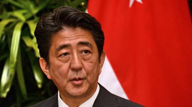 Abe's spring festival offering of a'masakaki ceremonial tree at the Yasukuni shrine which some see as a symbol of Japanese militarism in World War Two as it honours convicted war criminals among other war dead comes as Foreign Minister Fumio Kishida