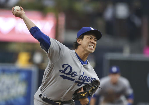 Los Angeles Dodgers starting pitcher Kenta Maeda throws against the San Diego Padres in the first inning of a baseball game Wednesday