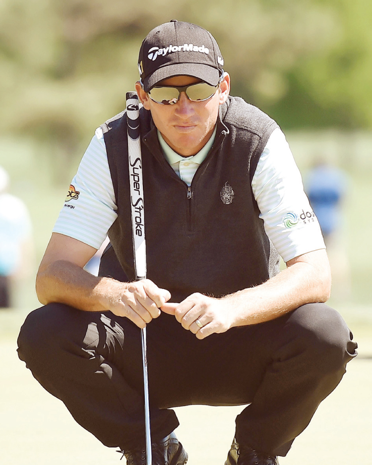 Jim Herman of the United States birdies the fourth hole during the final round of the Shell Houston Open