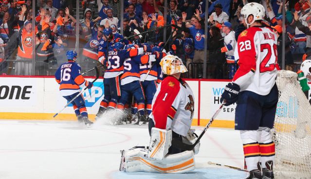 John Tavares is mobbed after scoring the series-clincher vs. the Panthers Sunday night