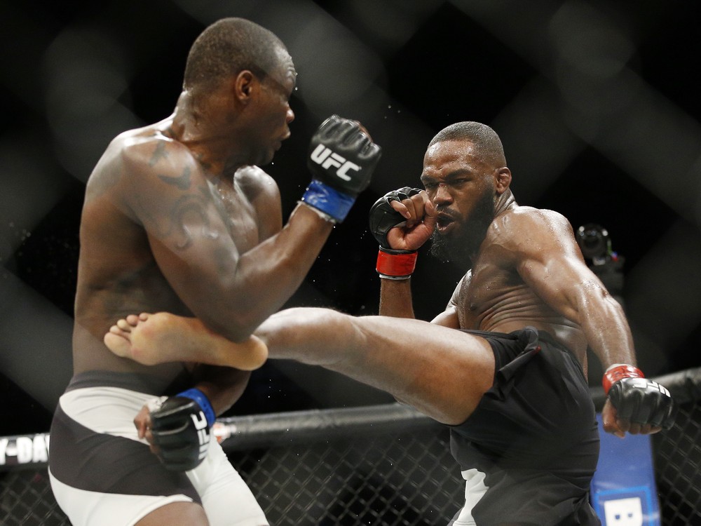 Jon Jones right kicks Ovince Saint Preux during an interim light heavyweight championship mixed martial arts bout at UFC 197 Saturday