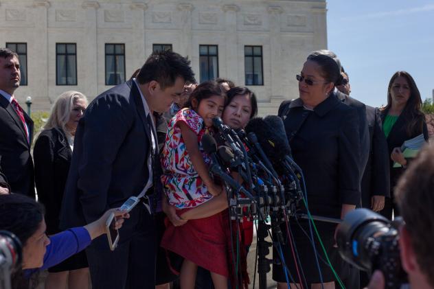 Immigrant activists including Jose Antonio Vargas and Sophie Cruz speak to reporters after oral arguments at the Supreme Court