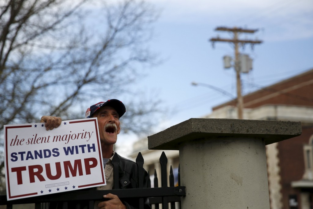 A Donald Trump supporter yells at ant Trump protesters following a campaign rally for Republican U.S. presidential candidate Donald Trump at The Klein Memorial Auditorium in Bridgeport Connecticut U.S