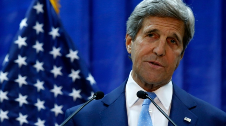 US Secretary of State John Kerry speaks during a press conference in Baghdad