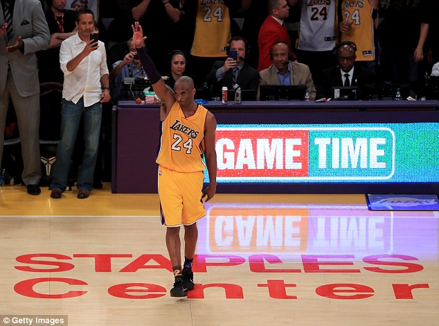 Kobe Bryant waves to his fans for one last time after the game against the Utah Jazz earlier this month. The 37-year-old got a standing ovation