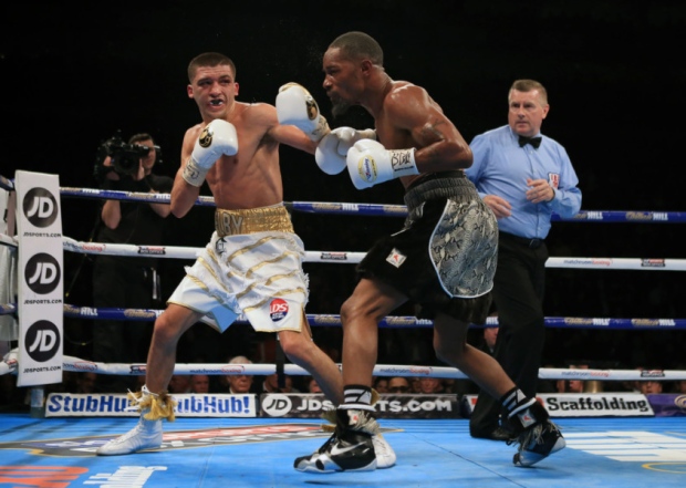 Lee Selby and Eric Hunter during the IBF Featherweight World Championship bout at the 02 Arena