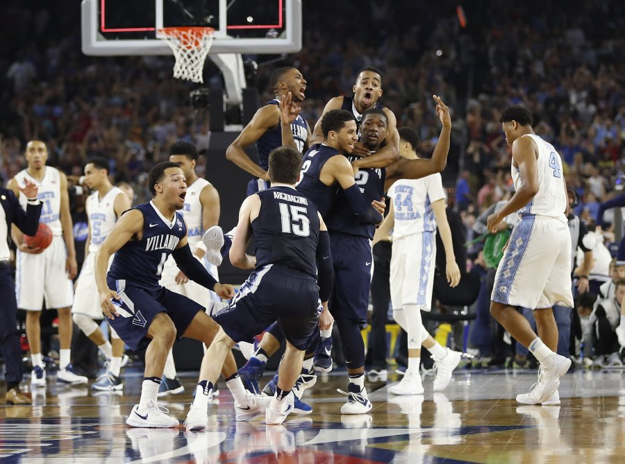 Villanova players celebrate after the NCAA Final Four tournament college basketball championship game against North Carolina Monday