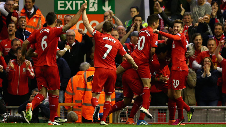 Liverpool players celebrate following Divock Origi's opening goal