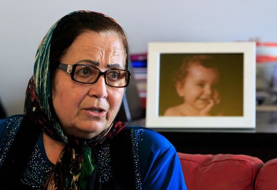 Lebanese Ibtissam Berri speaks during an interview with The Associated Press as she sits next to