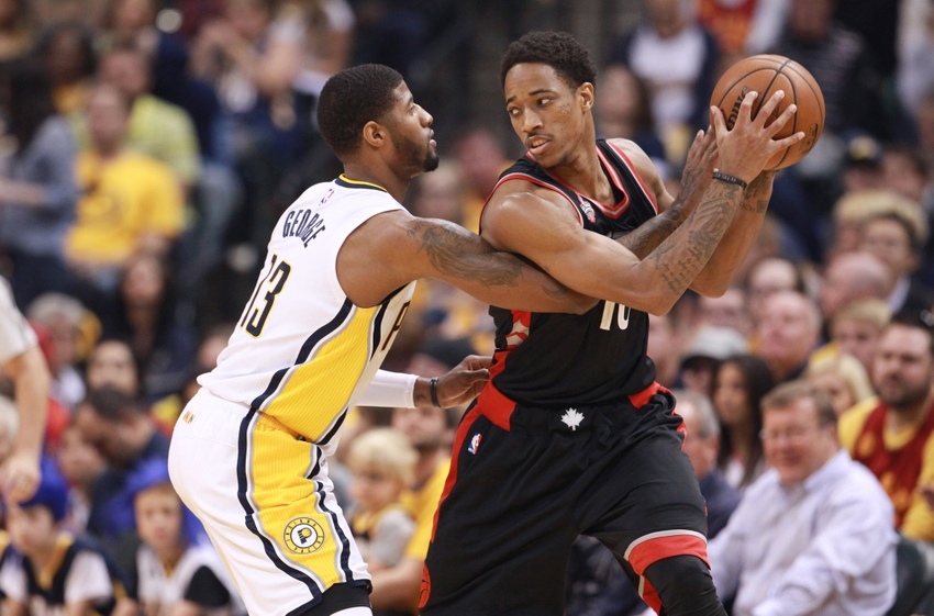 Apr 23 2016 Indianapolis IN USA Toronto Raptors forward De Mar DeRozan defended by Indiana Pacers forward Paul George during the first quarter in game four of the first round of the 2016 NBA Playoffs at Bankers Life Fieldhouse. Mandatory Cre