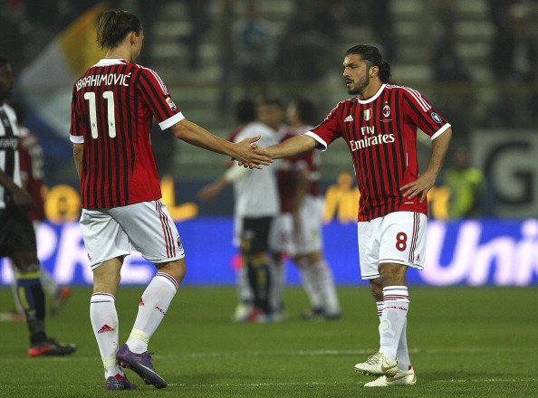 PARMA ITALY- MARCH 17 Zlatan Ibrahimovic and Gennaro Gattuso of AC Milan celebrate a victory at the end of the Serie A match between Parma FC and AC Milan at Stadio Ennio Tardini