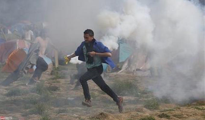 Migrants tear gassed as they try to break through border