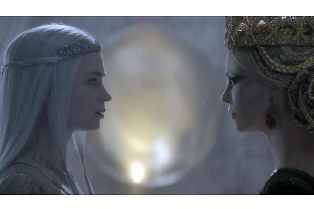 Emily Blunt and Charlize Theron in a still from ‘The Huntsman Winter’s War