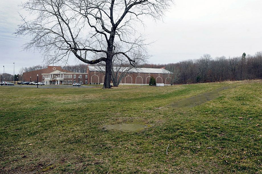 Open land next to the Newtown Youth Academy where the community center is planned