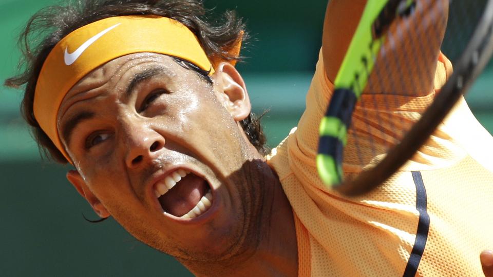 Spain's Rafael Nadal plays a return to Andy Murray of Great Britain during their semi final match of the Monte Carlo Tennis Masters tournament in Monaco Saturday