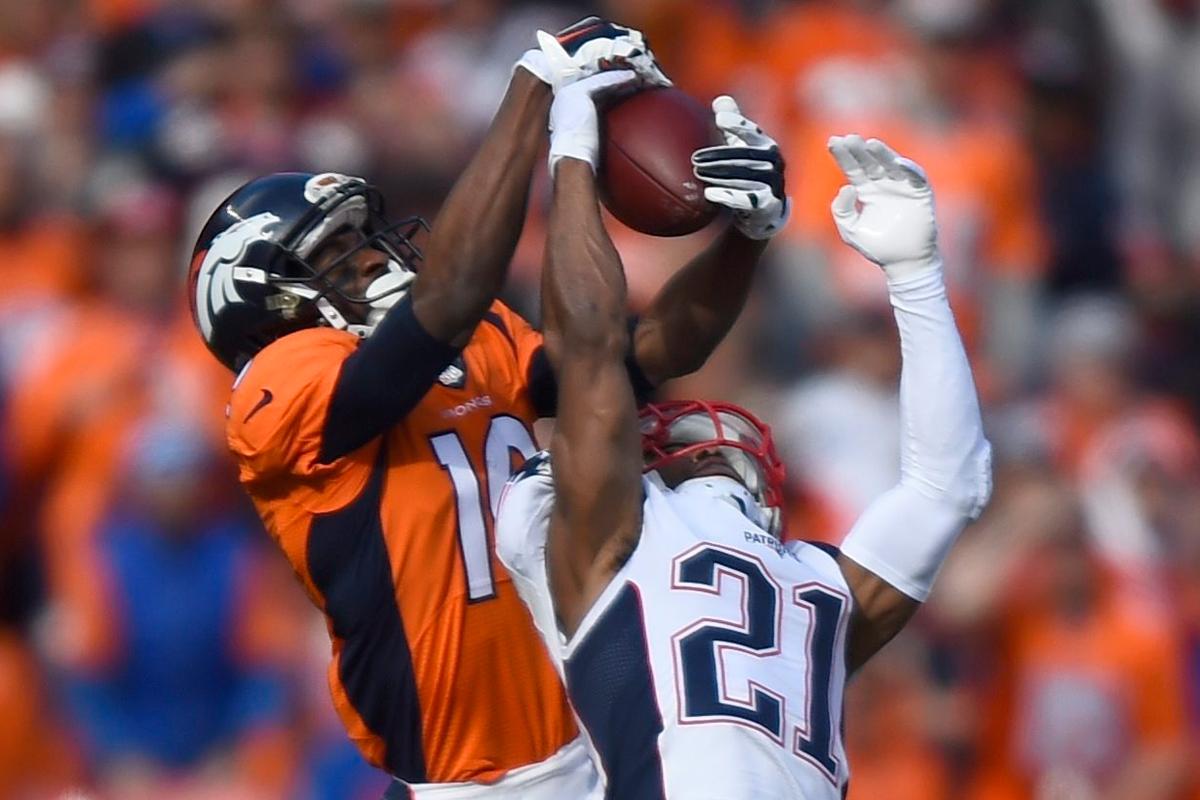 New England Patriots cornerback Malcolm Butler breaks up a pass to Denver Broncos Emmanuel Sanders