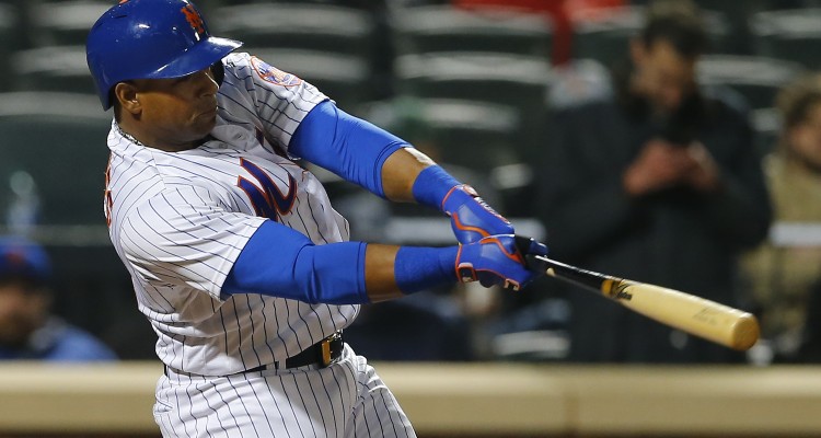 NEW YORK NY- APRIL 26 Yoenis Cespedes #52 of the New York Mets hits a game tying three run home run against the Cincinnati Reds in the seventh inning of a game at Citi Field