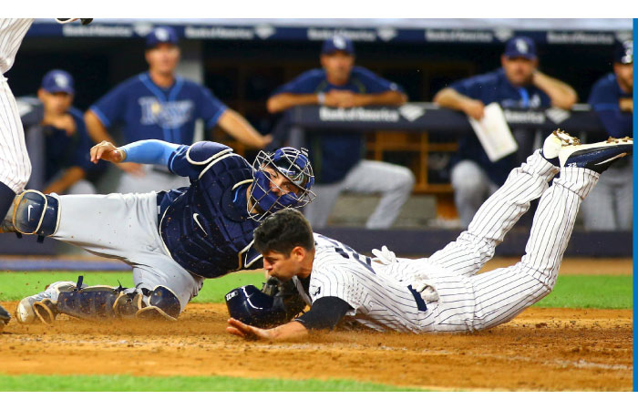 New York Yankees’ pinch hitter Jacoby Ellsbury steals home against the Tampa Bay Rays in the fifth inning at Yankee Stadium Friday. — Reuters