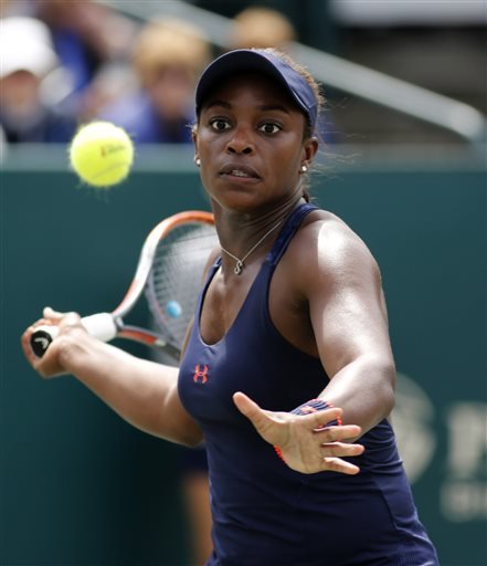 Sloane Stephens of the U.S. returns a shot to Elena Vesnina of Russia during their finals tennis match at the Volvo Car Open in Charleston S.C. Sunday