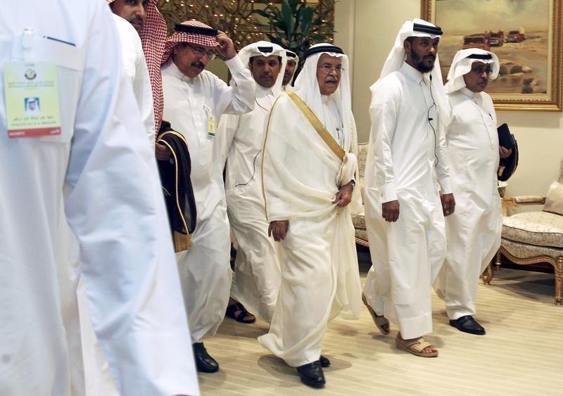 Saudi Arabia's Oil Minister Ali al Naimi arrives to a meeting between OPEC and non-OPEC oil producers in Doha