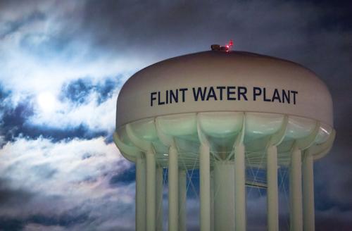 Officials face criminal charges for the first time in Flint water crisis