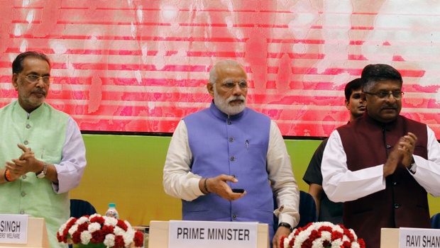 PM Narendra Modi launches National Agriculture Market in New Delhi on Thursday. Also seen are Ministers Radha Mohan Singh and Ravi Shankar Parsad | EPS