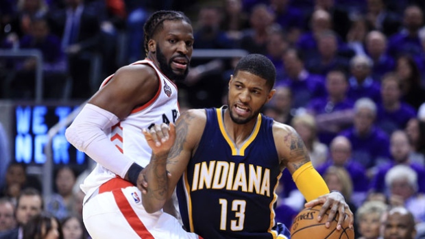 Paul George right of the Indiana Pacers tries to get past Toronto Raptors defensive specialist De Marre Carroll in Game 2 Thursday night. Carroll kept George in check as the Raptors won 101-85 to take a 2-1 series lead